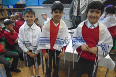 Children dressing to celebrate a Jewish festival